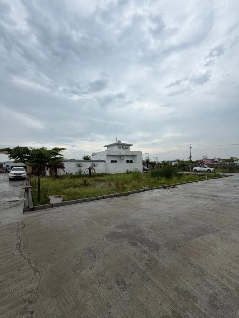 Palm City Haridwar — site office building beside the internal road