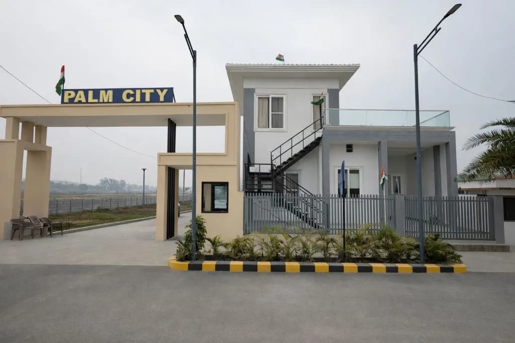 Palm City Haridwar — township entry gate and site office